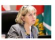A photo of Councillor Kavanagh in a meeting.